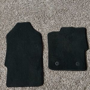 Brand new Ford Ranger carpet floor mats with teeth on the backside.